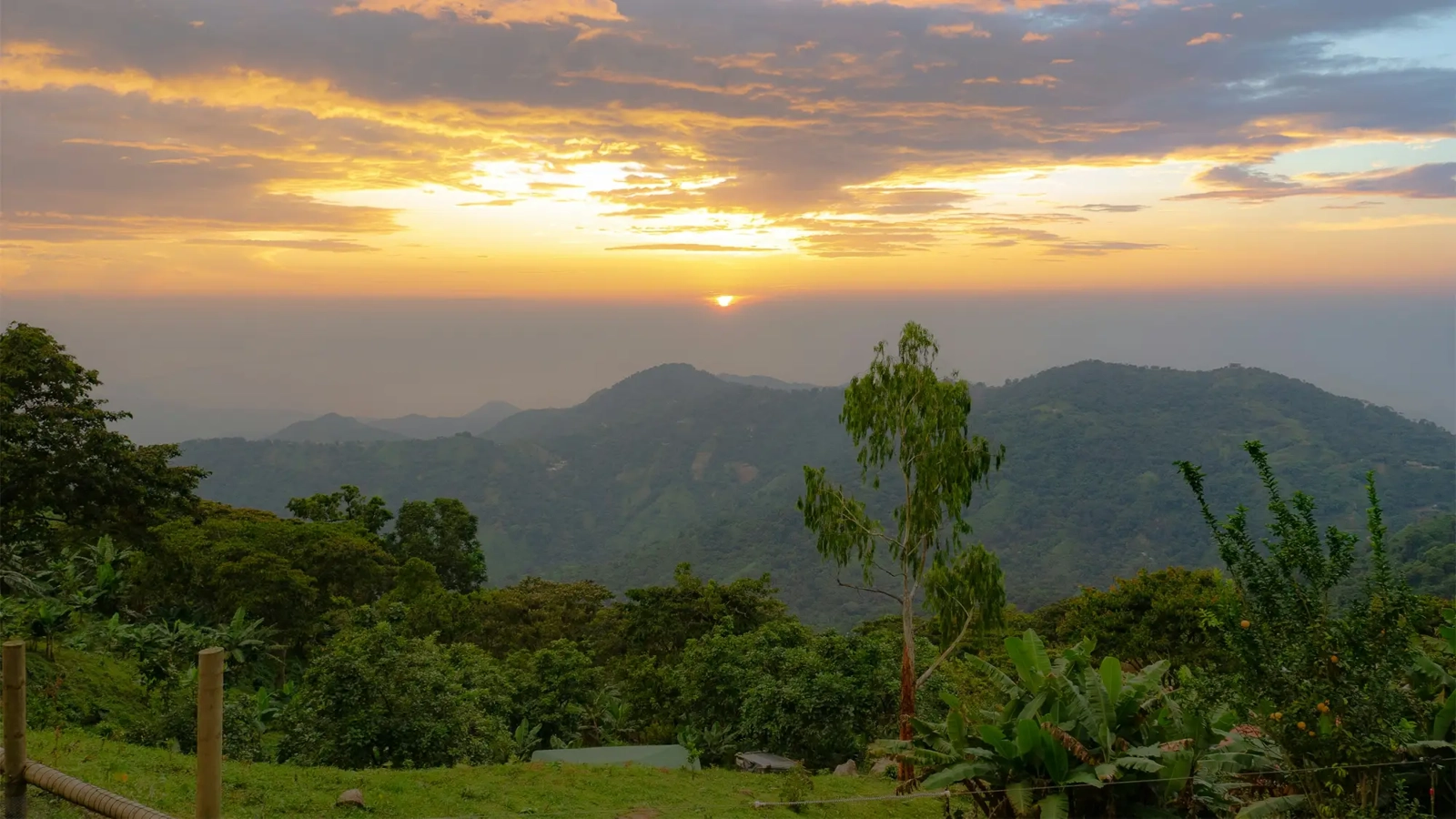 The sun setting over mountains in Colombia