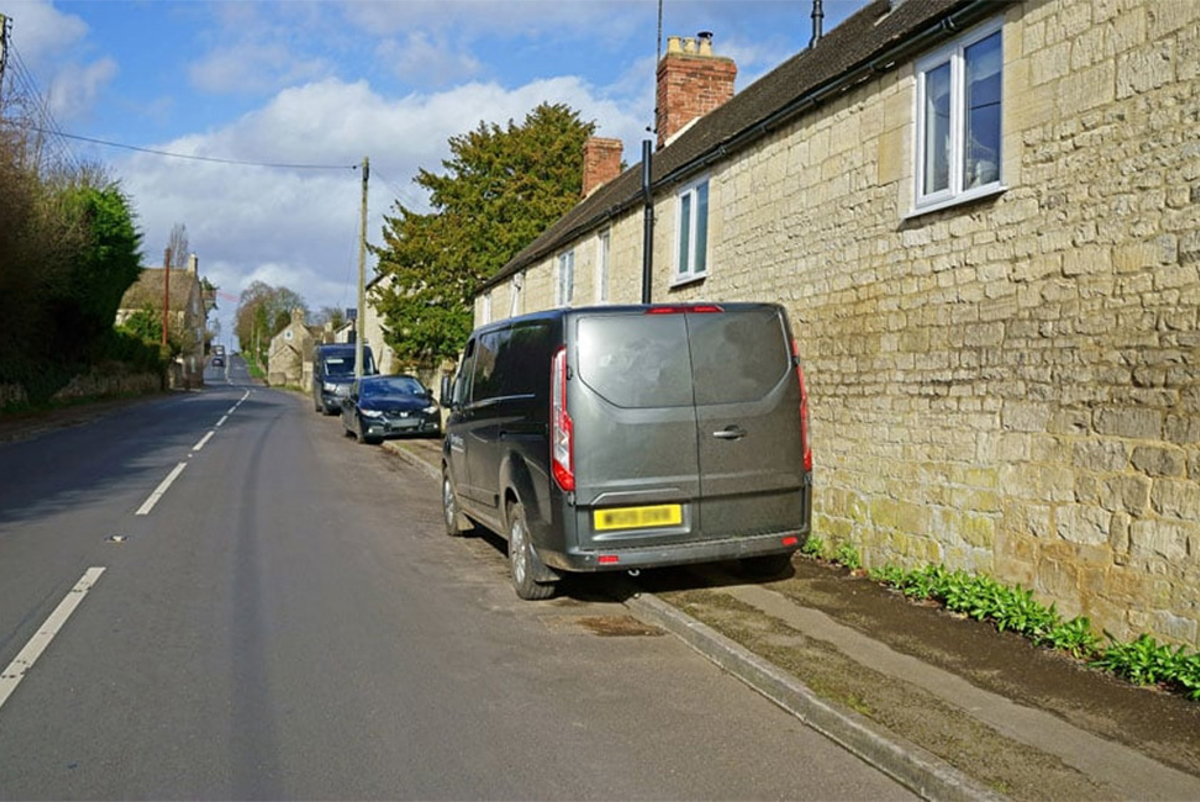 Van parked on the pavement