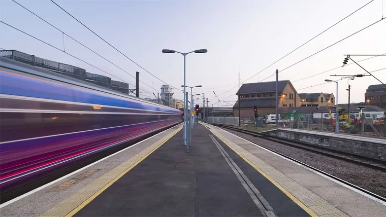 Train speeding through a station