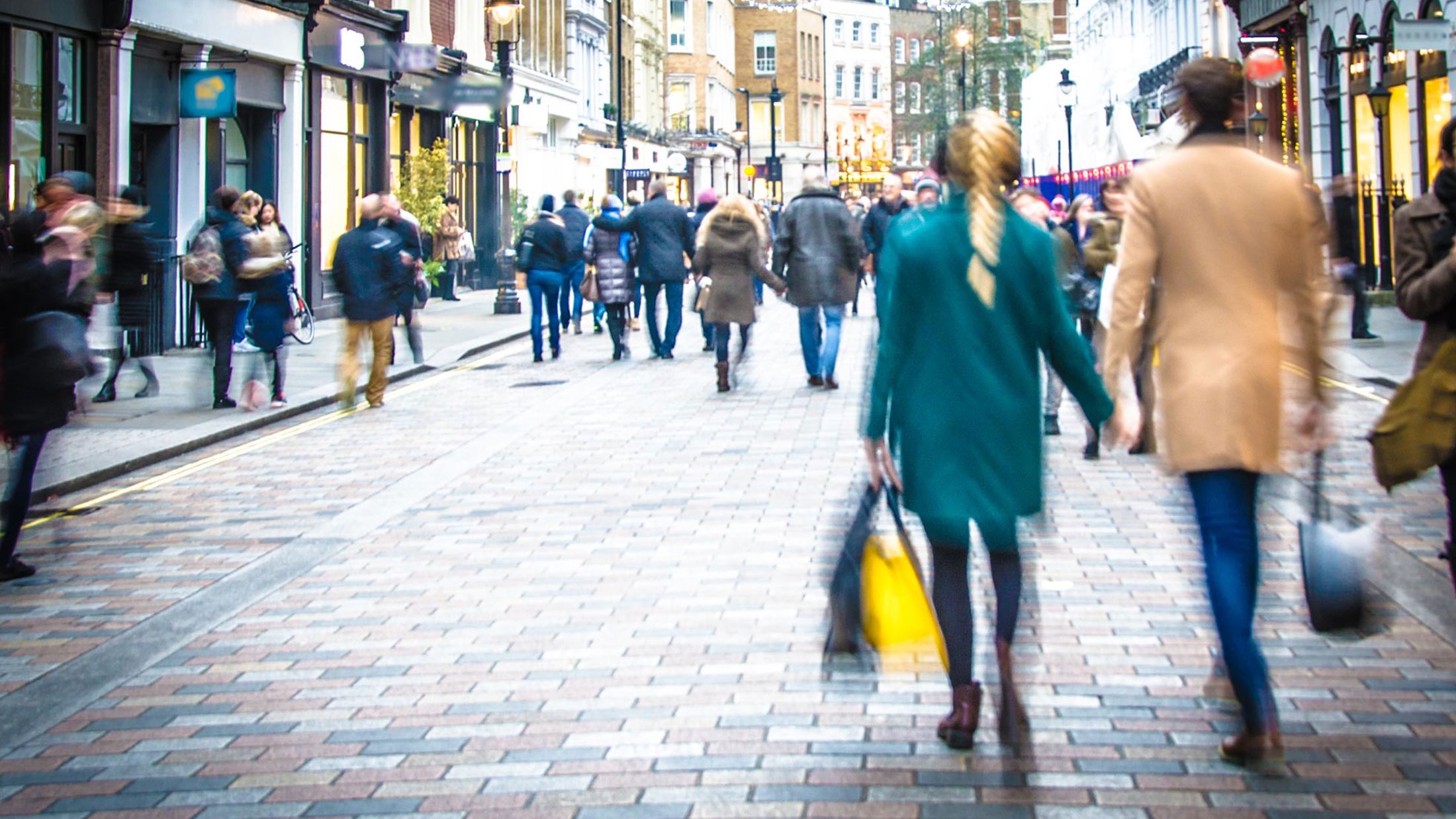 People walking down a street in the UK