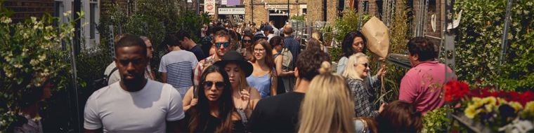 People walking down a busy street