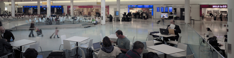 Passengers inside an airport terminal building