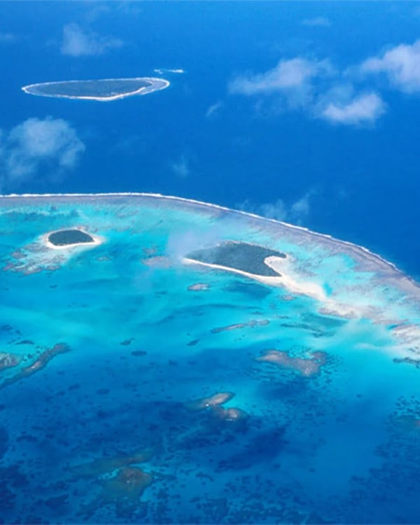 Aerial view of a chain of islands surrounded by sea