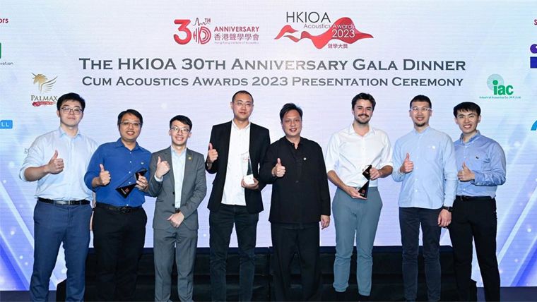 Staff celebrate their success at the HKIOA awards