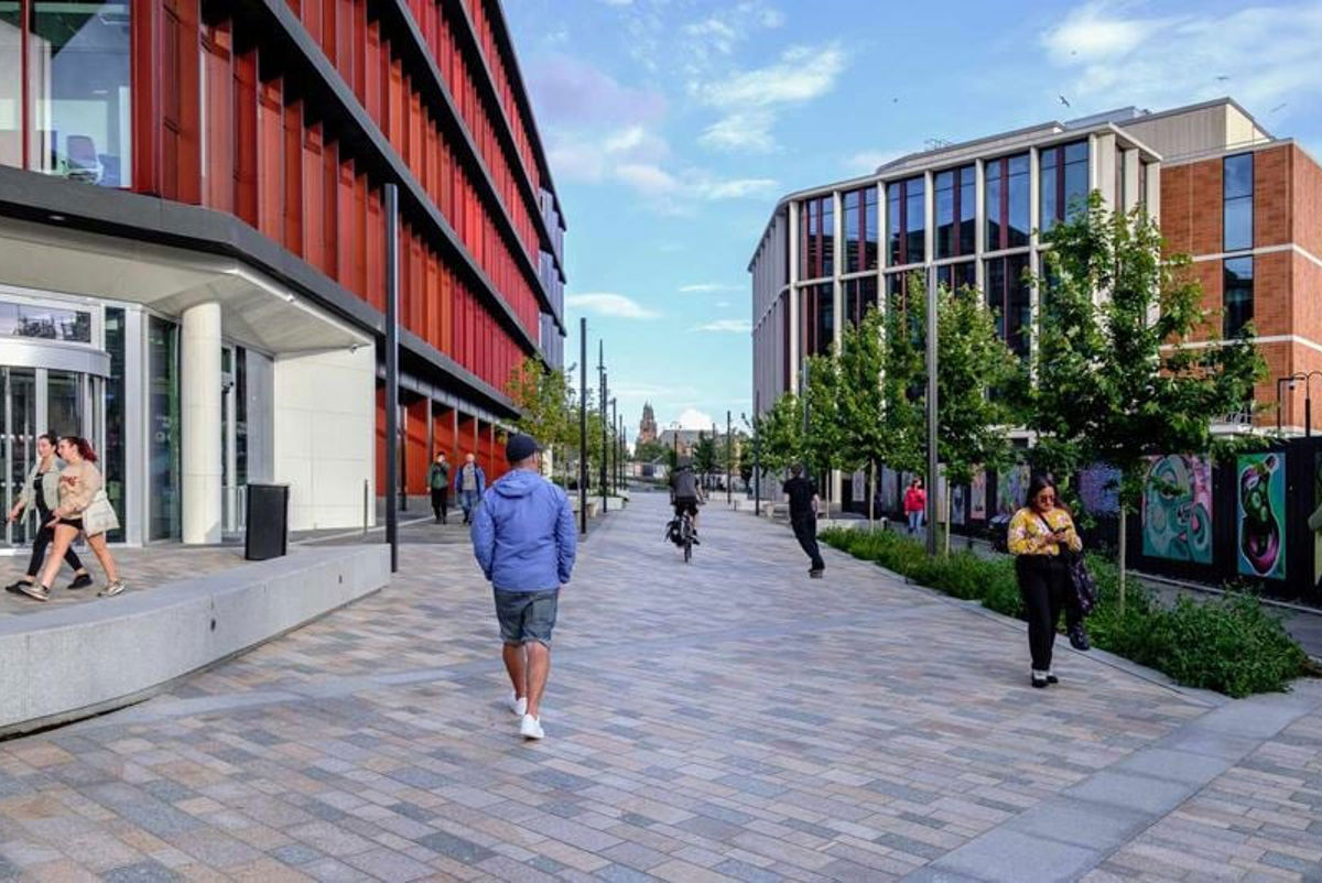 People walking around the University of Glasgow's Western Campus