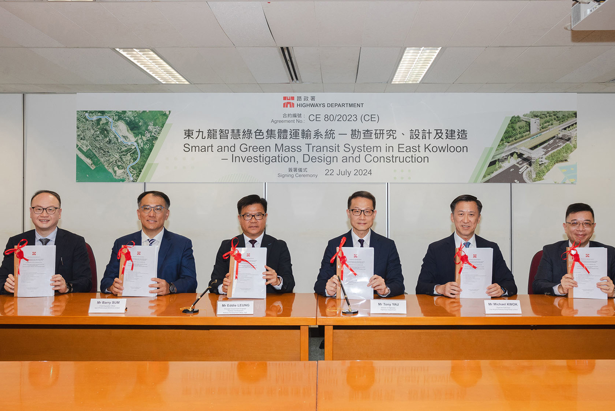 Six representatives from Arup-AIS Joint Venture at an agreement signing