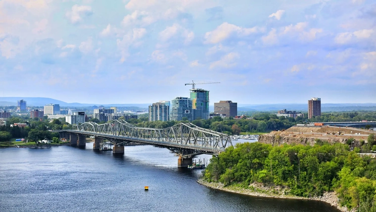 The Alexandra Bridge in Ottawa with the city in the background