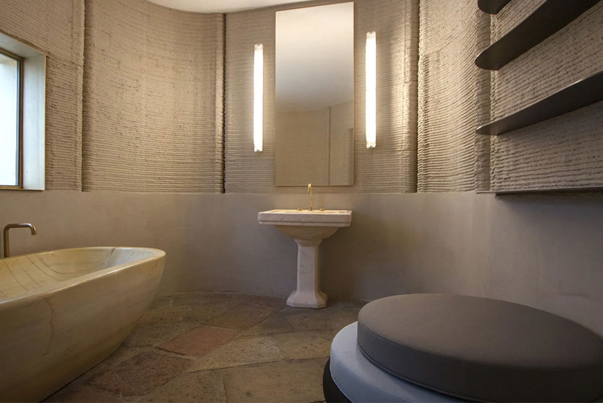 A bathroom inside a 3d concrete printed house