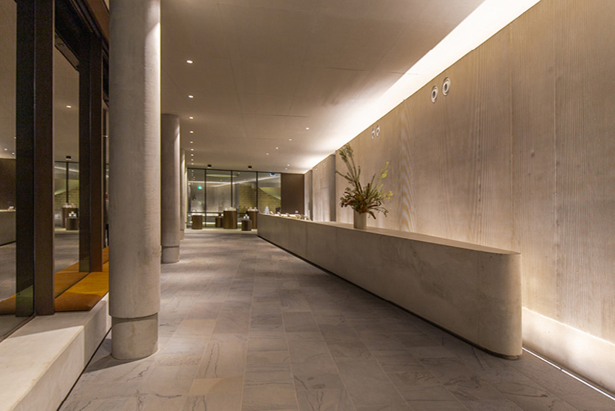 Ambient lighting at the long reception desk and foyer at a spa retreat