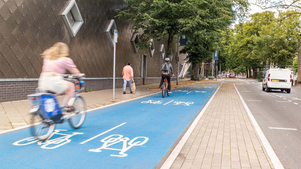 People cycling along a cycle lane