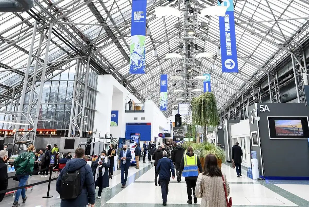 Delegates on the COP26 concourse