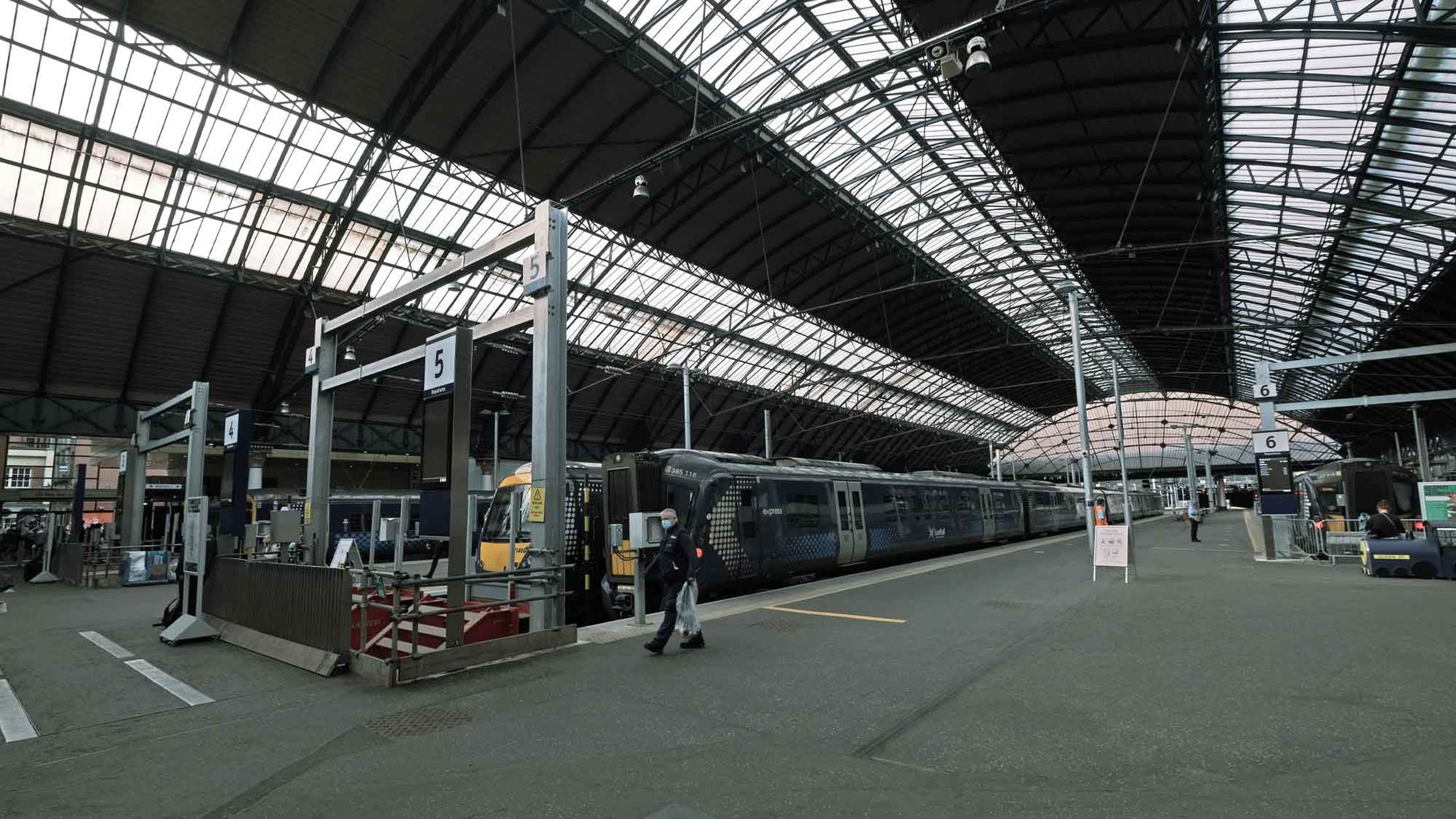 Trains waiting at platforms