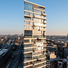 Exterior shot of HAUT, a tall timber-hybrid residential building. Credit: Jannes Linders