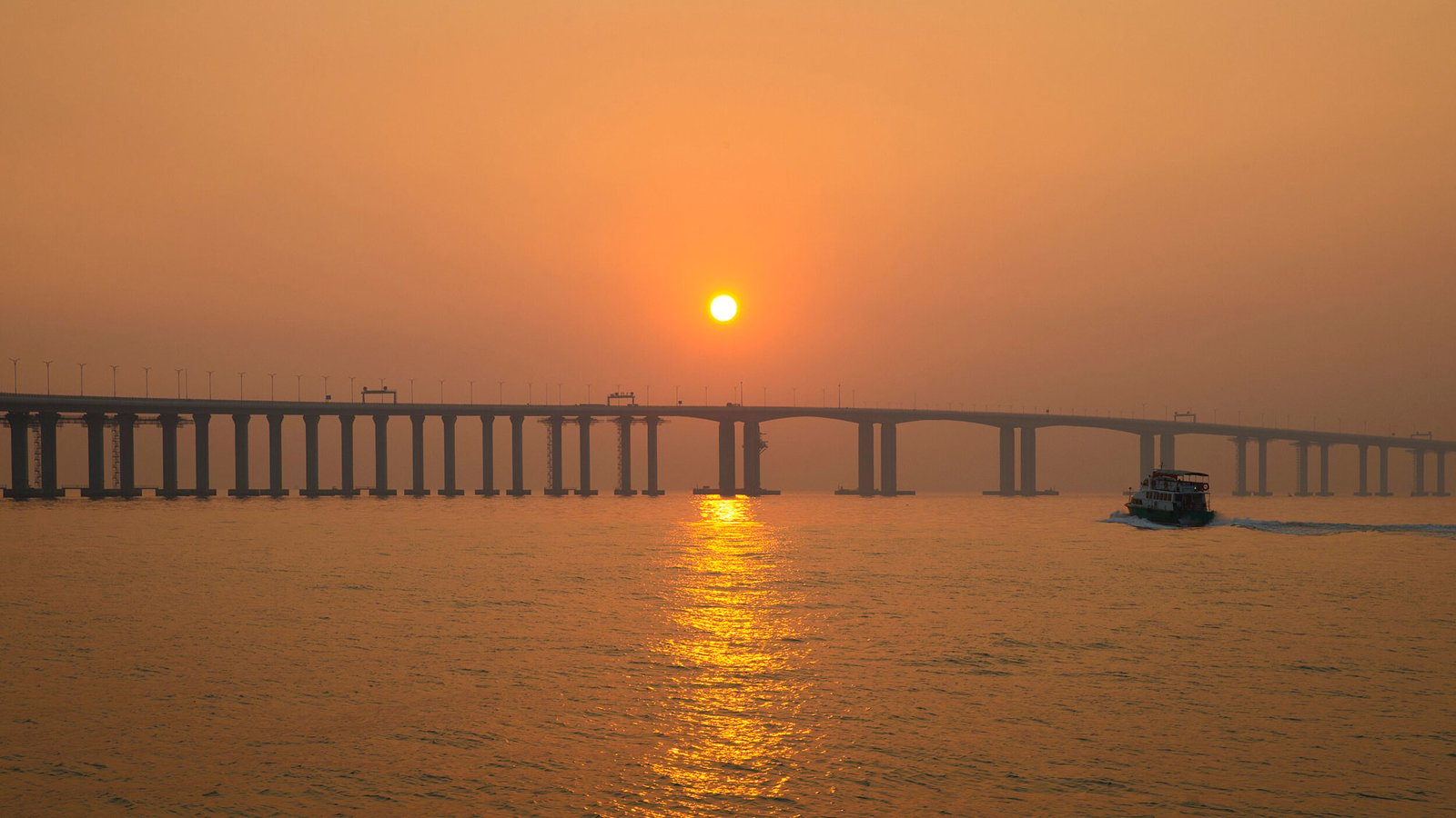 Sun setting being the Hong Kong Zhuhai Bridge link road