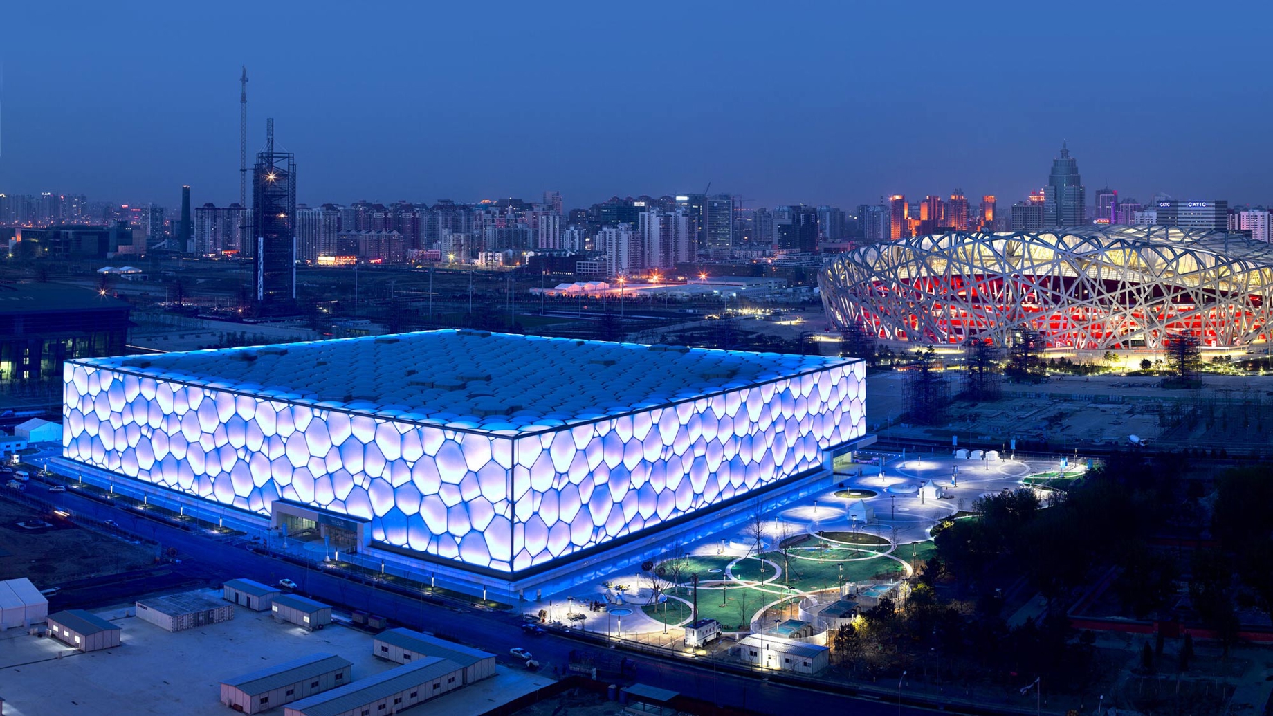 A view of the Water Cube in Beijing at night in the city