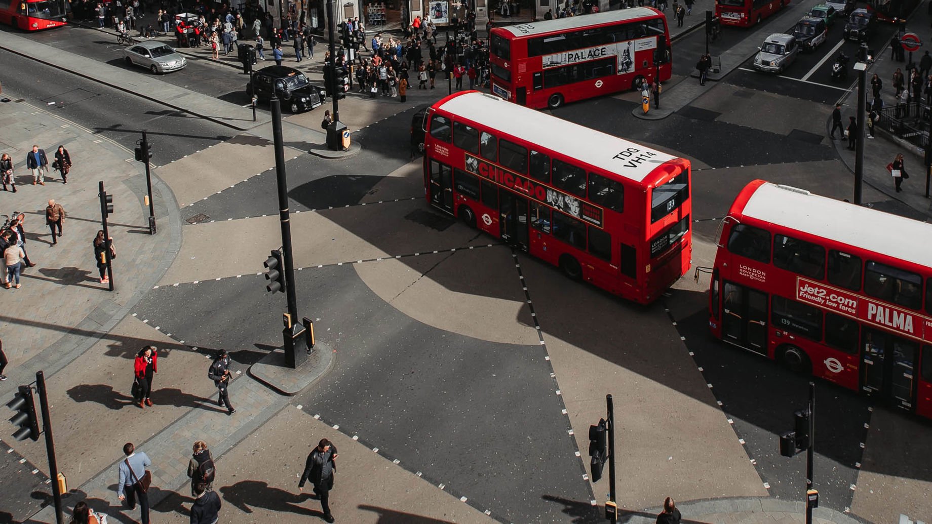 Buses and pedestrians at Oxford Circus in London