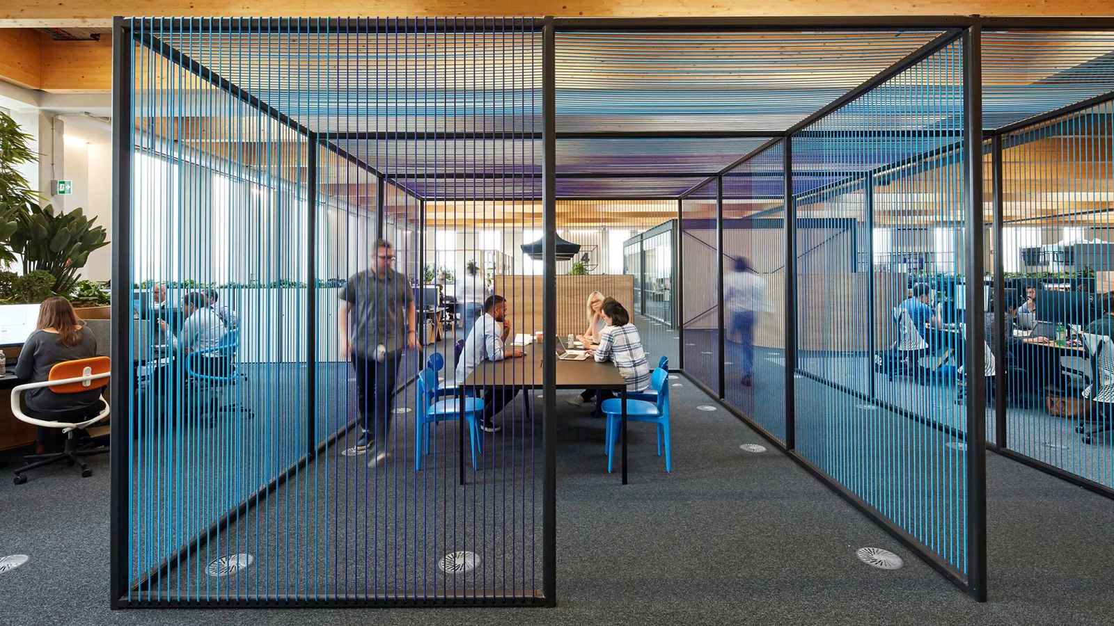 People in meeting spaces at the sky central building. Credit: Hufton and Crow