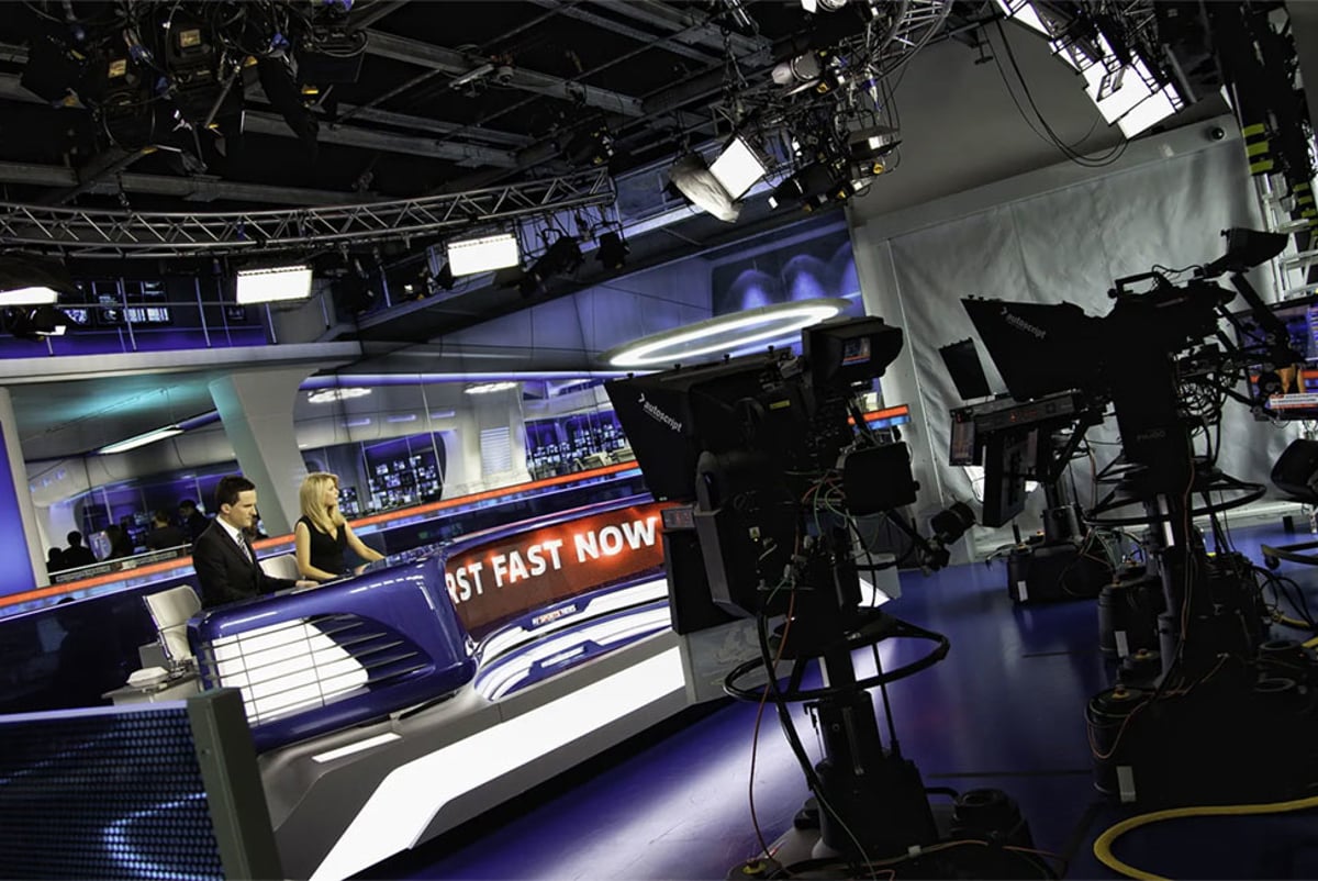 Staff at work in the news studio