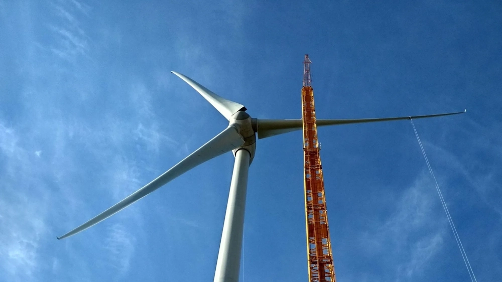 A close up of a wind turbine