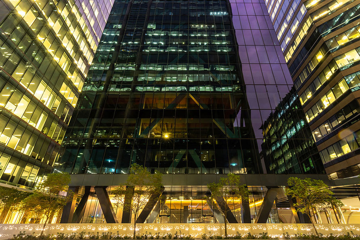 Street view looking up at WS2 building at night time.