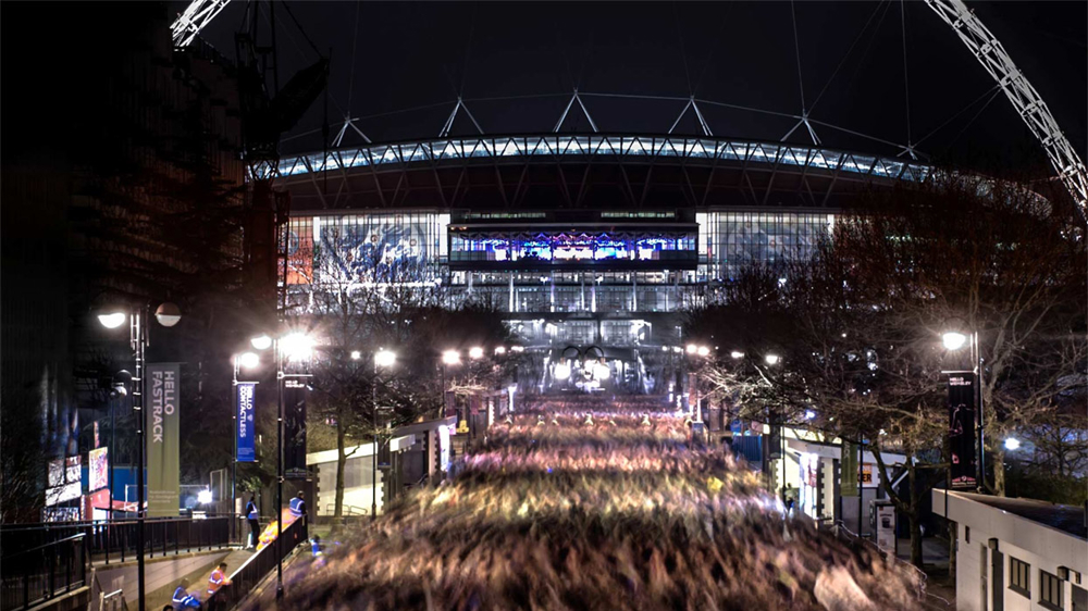 Crowds approaching Wembley Stadium in London